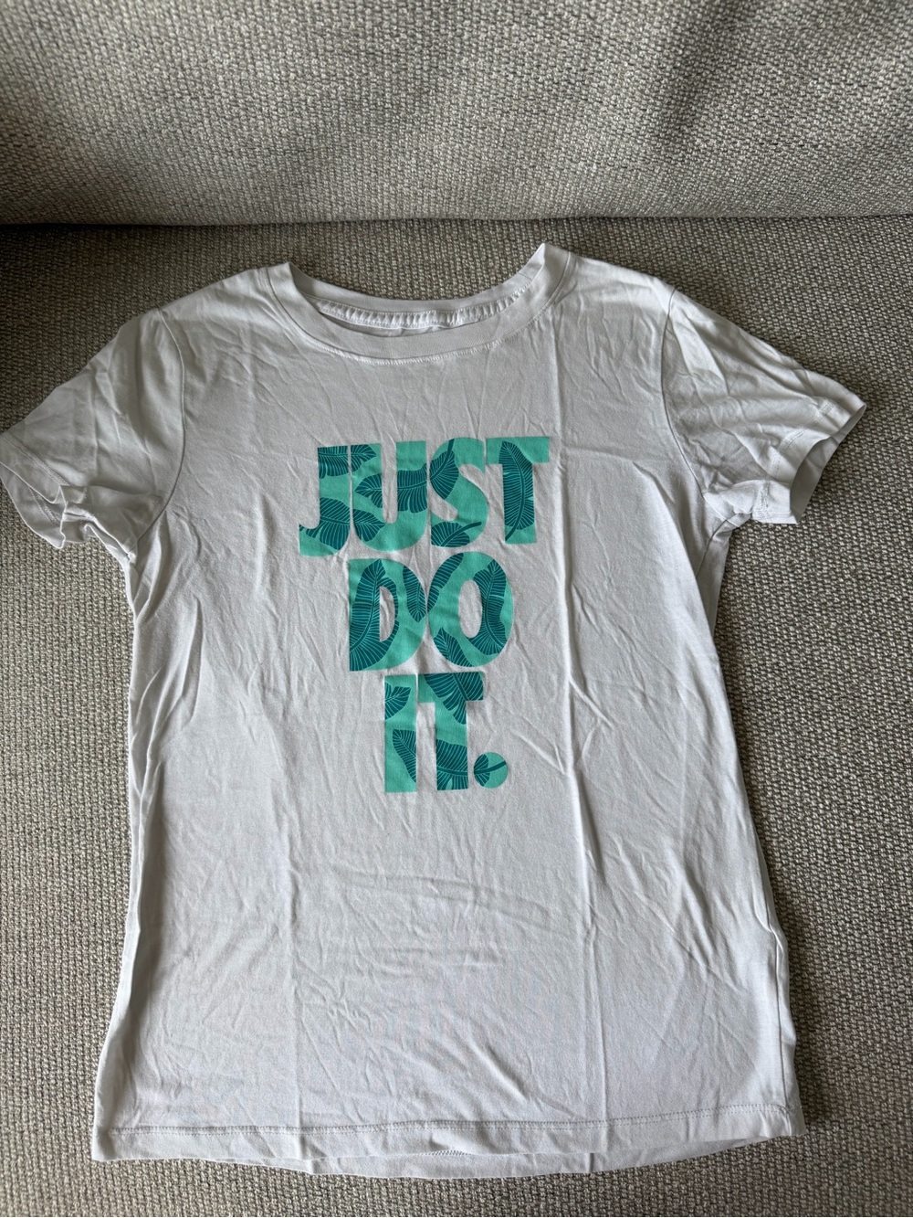 Nike White Tee with Teal Graphic "Just Do It."